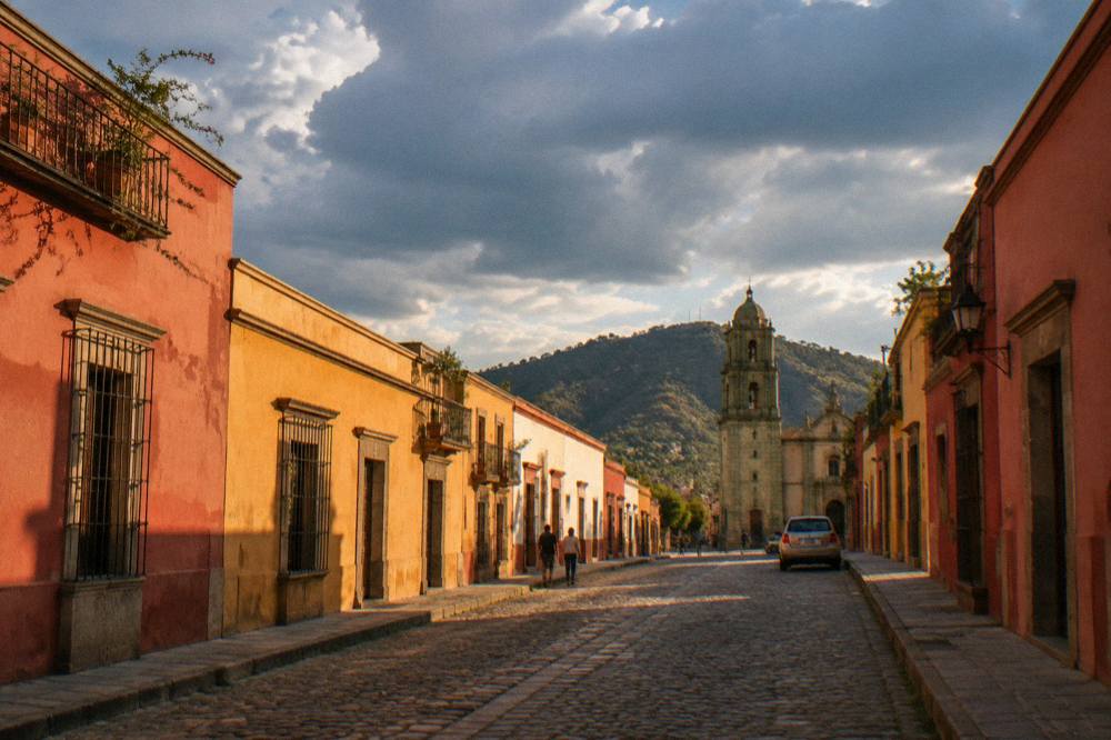 Rain clouds gathering over the rooftops and hills of Oaxaca City