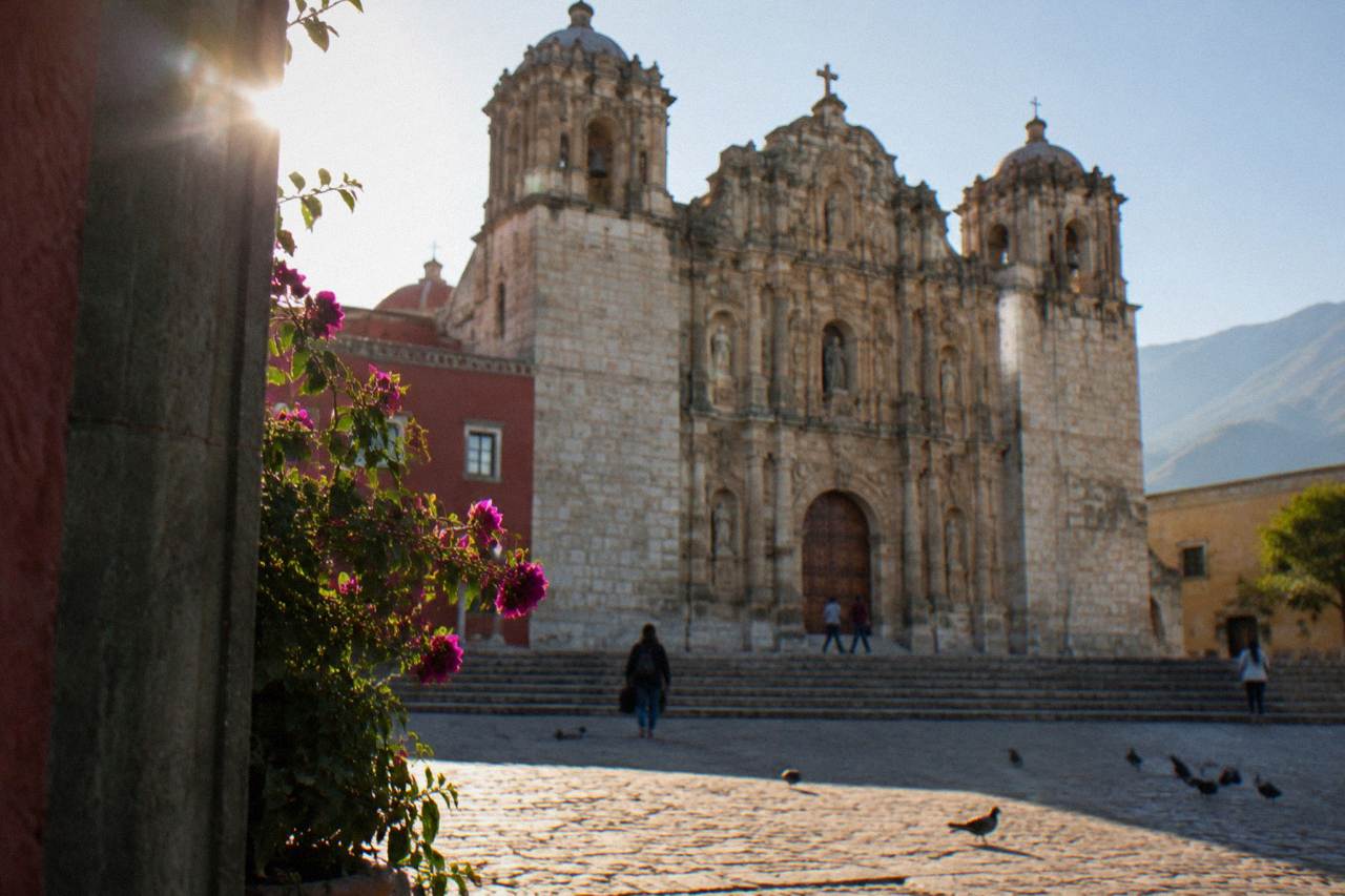 The church facade of the Basílica de la Soledad in Oaxaca City seen from the square in front of it