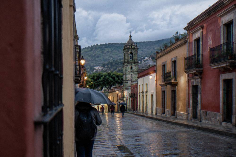 Afternoon clouds gathering over the hills surrounding Oaxaca City during the rainy season