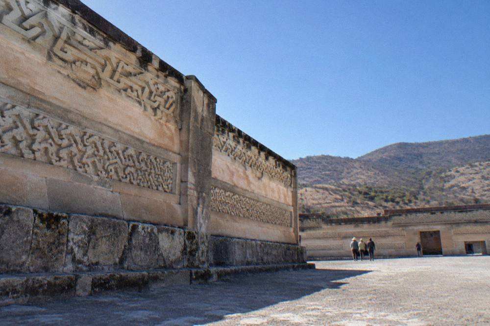Ancient stone fretwork walls at the Mitla archaeological zone near Oaxaca