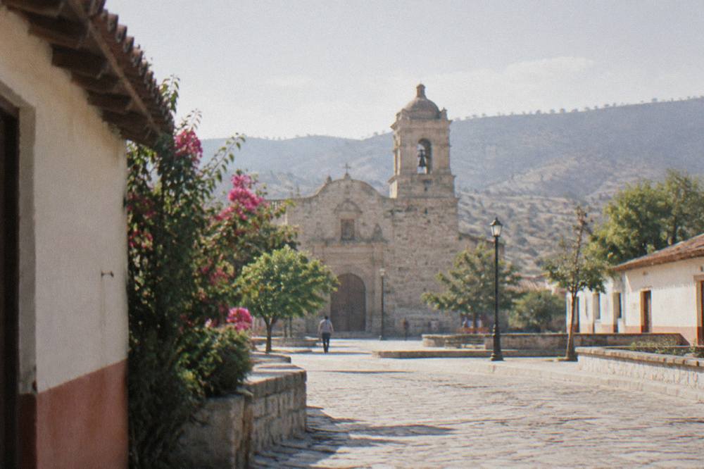 The church and open plaza at the centre of Tlacolula in morning light