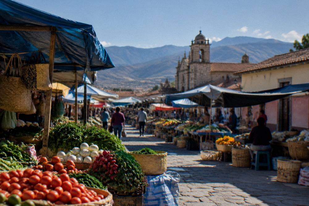 A sunny street in a highland Mexican town with mountains in the distance