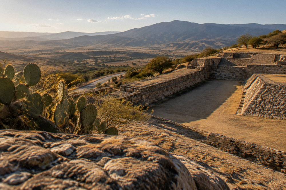 A quiet mountain road winding through the Oaxaca Valles Centrales toward ruin sites
