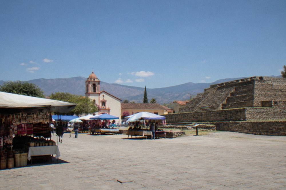 Stone structures of the Zaachila archaeological zone under a clear sky in the Oaxaca valleys