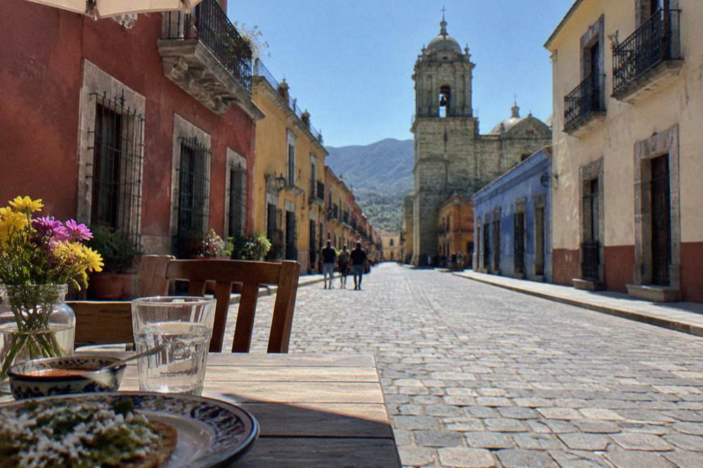 Set restaurant table in a Centro courtyard, no signage