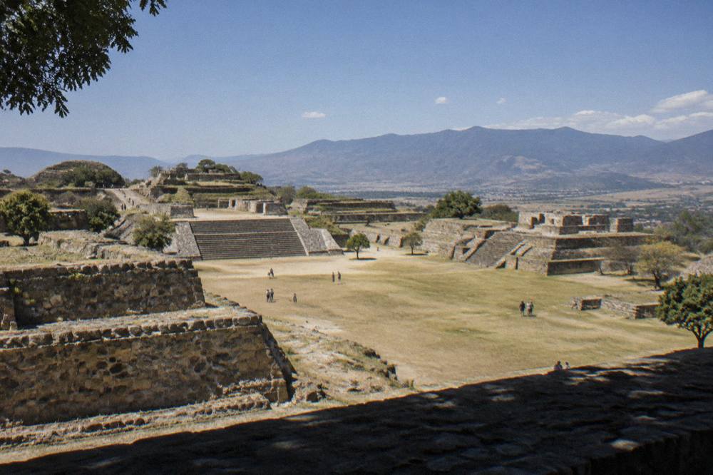 Terraces and stone structures of the Monte Albán archaeological site on a hillside