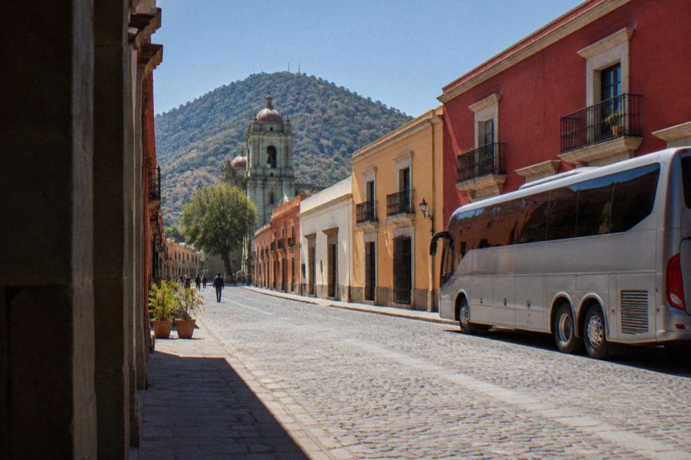 A long-distance bus parked at a terminal in Mexico