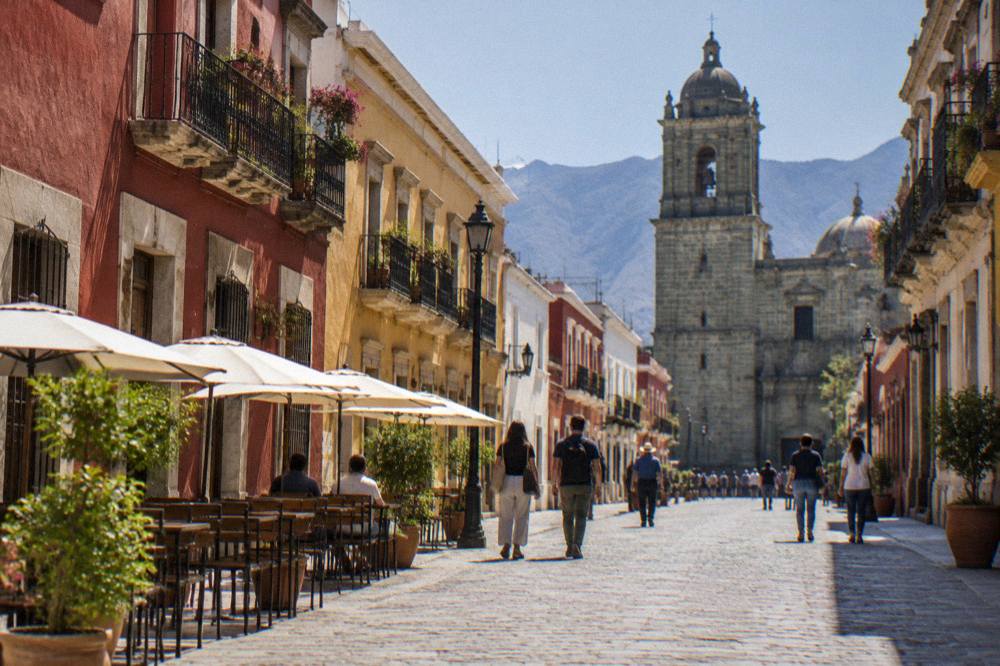 The Andador Macedonio Alcalá pedestrian street in Oaxaca lined with buildings and walkers