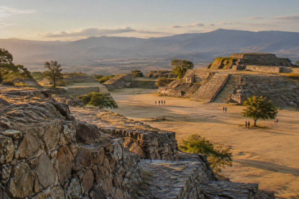 Stone terraces and foundations of the Monte Albán archaeological zone on a hilltop