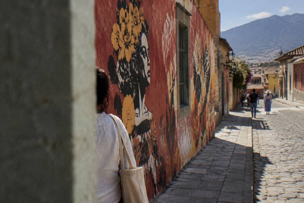 A bright mural covering the wall of a house in the Jalatlaco neighbourhood