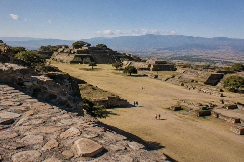 The Grand Plaza of Monte Albán archaeological site seen from the upper platform on a clear morning