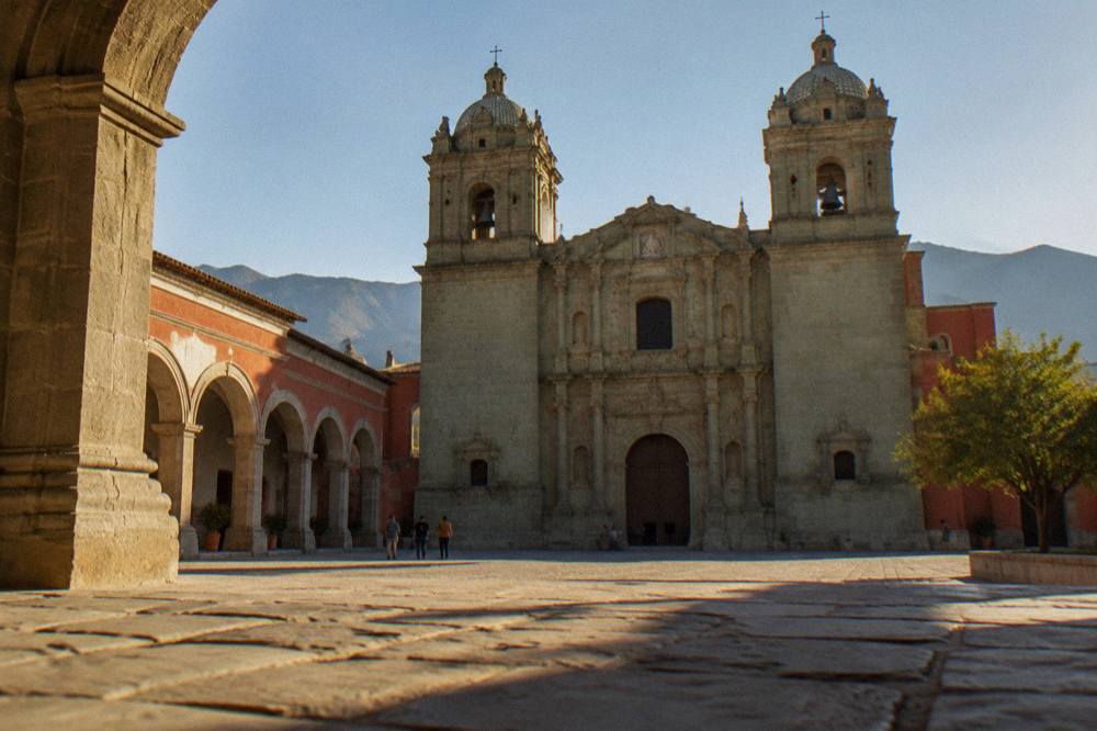 Interior courtyard of the Santo Domingo cultural complex with stone arches