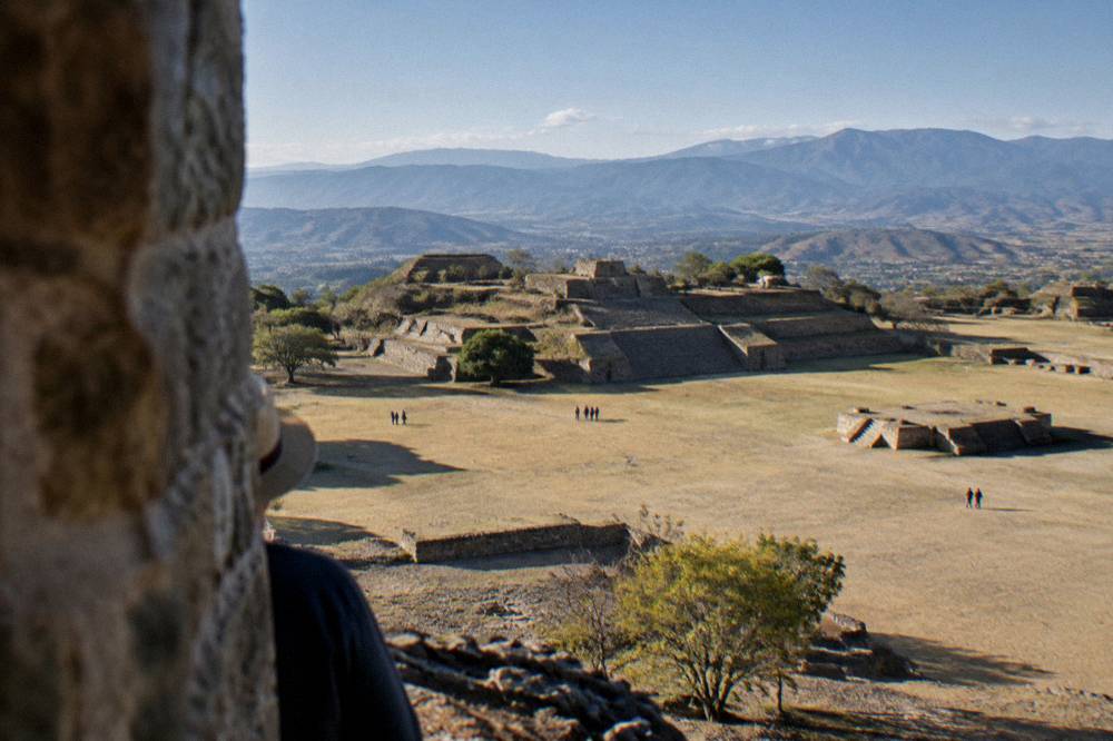View across the Grand Plaza of Monte Albán above the Oaxaca valley in late afternoon light